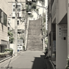 Aoi Building and Onnazaka stairs in Tokyo, the real-life locations featured in the Chainsaw Man Reze Arc.