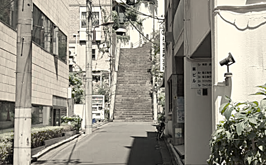 Aoi Building and Onnazaka stairs in Tokyo, the real-life locations featured in the Chainsaw Man Reze Arc.